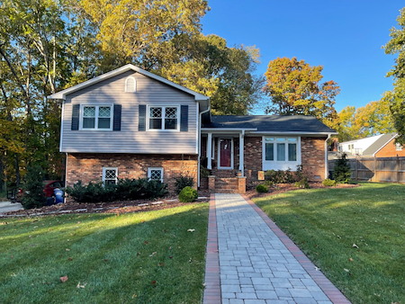 What are the signs your home needs professional house washing this season